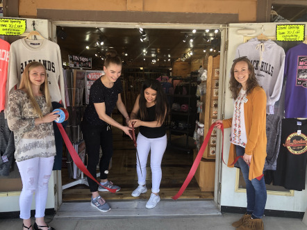 shop ribbon cutting