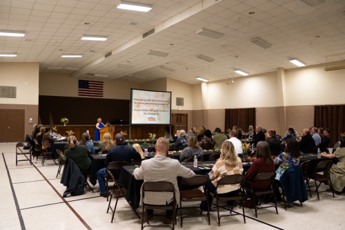 business meeting with people viewing a presentation